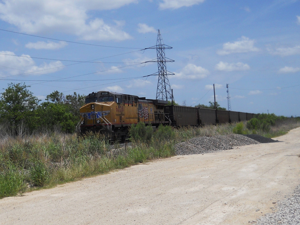 UP 6020  1Jun2011  South end of a NB train of empty coal cars passing JAMA 